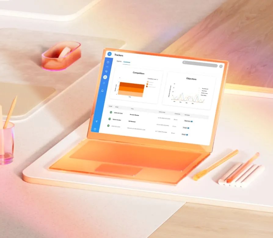 A sleek orange laptop on top of a table showing at-a-glance sales views