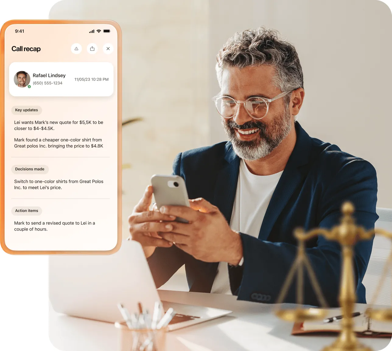 A lawyer holding his mobile phone in front of a laptop reading the call recap of a recent phone call