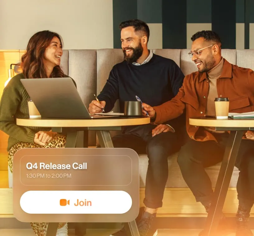 In-office employees using a shared laptop to join an online video meeting